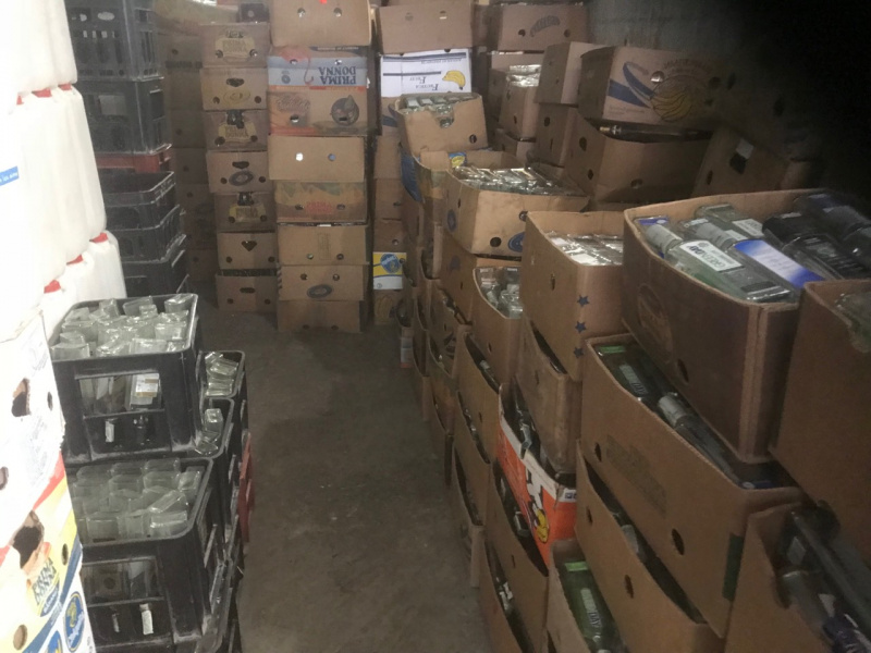 На Буковині викрили підпільний цех, у якому підробляли горілку відомих марок