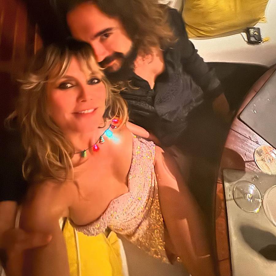 Heidi Klum shone in sparkling Christmas outfits during celebration - Photos