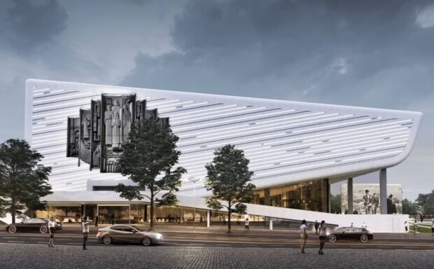 Знаменитый киевский кинотеатр разваливается на глазах: облицовка крушит авто под зданием (видео)