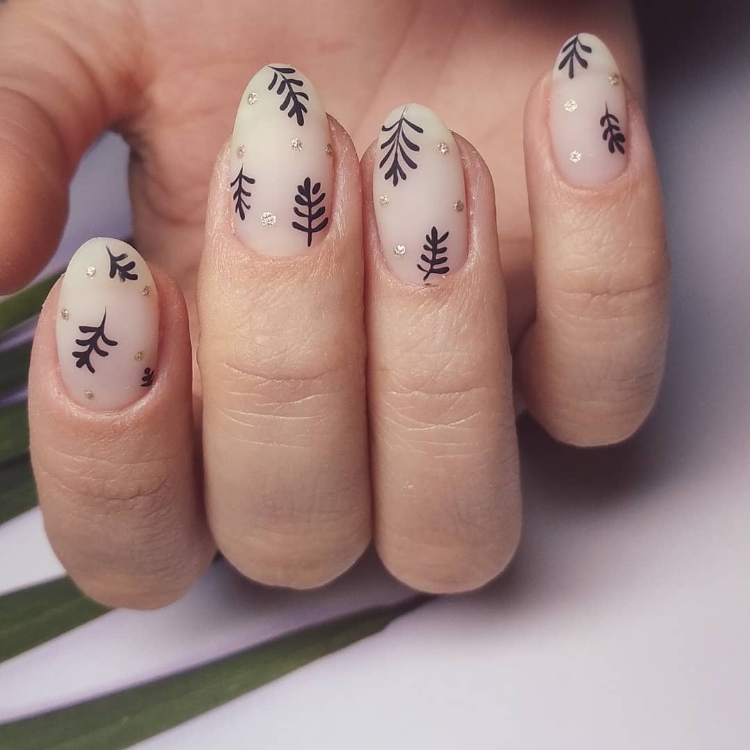 Ідеї модного манікюру на Новий рік 2025: святкові варіанти на короткі та довгі нігті