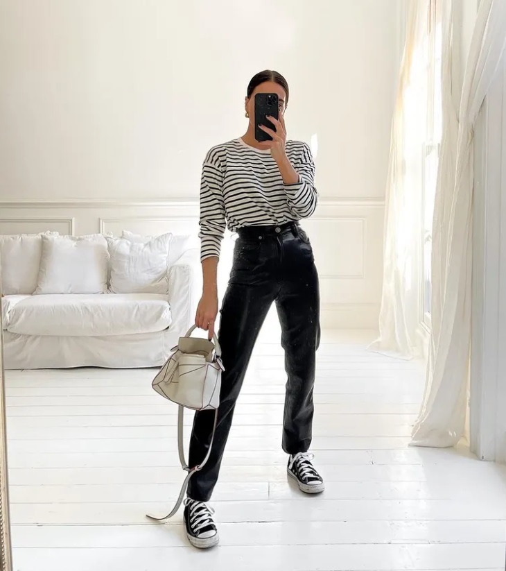 З яким взуттям носити шкіряні штани: моделі та образи на осінь 2024