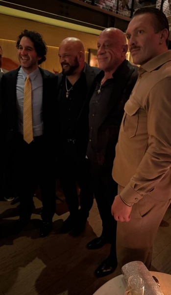 Boxing champ Usyk debuts in cinema — Fans cheer as he poses with The Rock