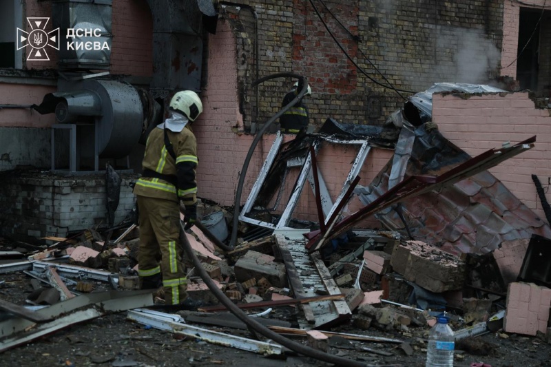 Russian attack on Kyiv hits homes, ignites warehouses and leaves people dead