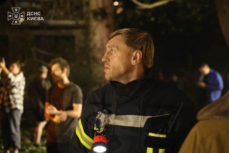 Russian attack on Kyiv hits homes, ignites warehouses and leaves people dead