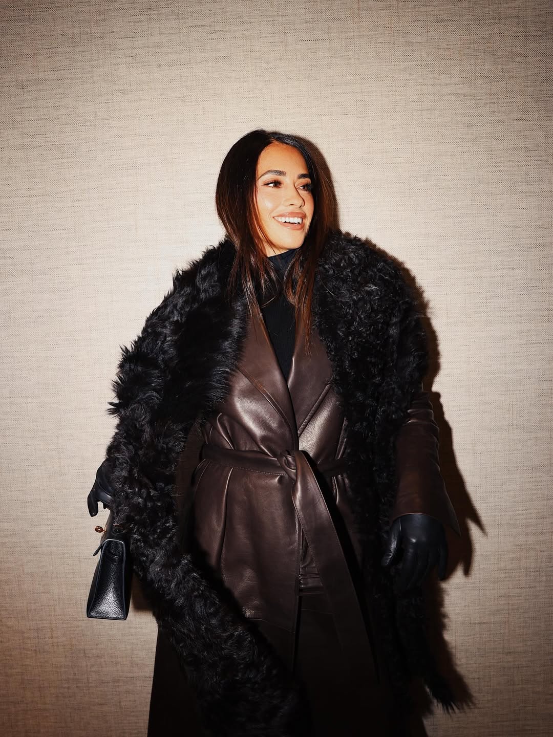 Messi's wife nails chic winter look with leather trench coat and faux fur scarf