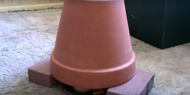 Простая печка собственными руками: из свечей, кирпичей и цветочных горшков