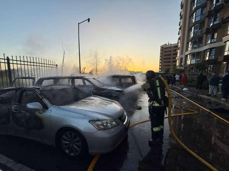 Russian drones and missiles hit Kyiv region, leaving homes and cars destroyed