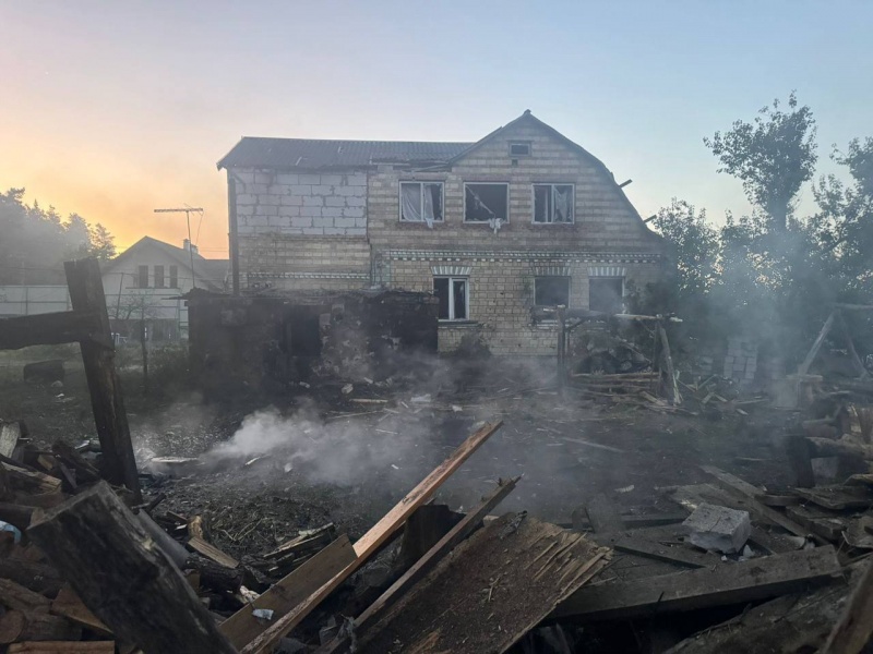 Russian drones and missiles hit Kyiv region, leaving homes and cars destroyed