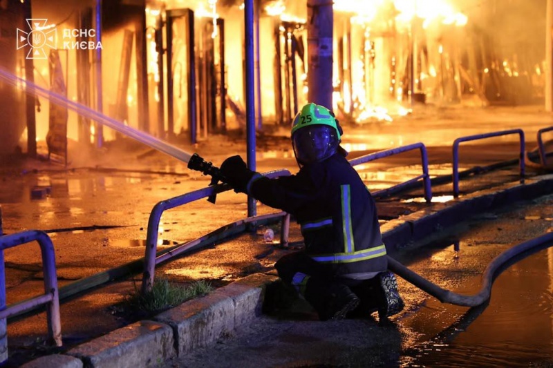 Russian missile strike ignites fire in Kyiv, woman hurt in attack