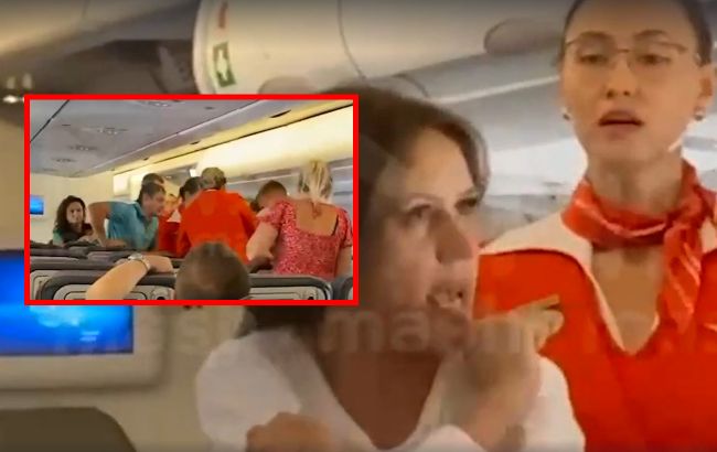 Россиянка устроила пьяный дебош в самолете: ее связывали скотчем (видео)