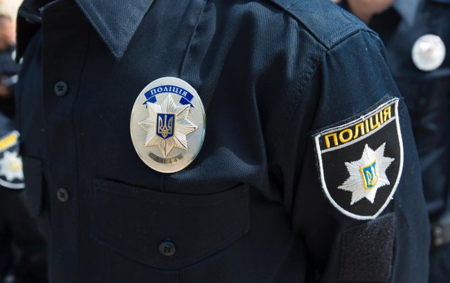 В Киеве задержали полицейского за кражу 17 тыс. долларов при оформлении ДТП