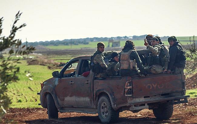 Сотни боевиков выходят из города Хараста в Восточной Гуте