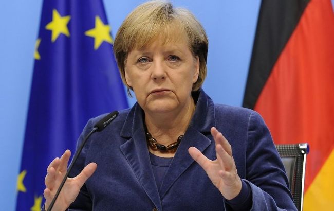 Меркель: "нормандская четверка" договорилась о ряде законов по Донбассу
