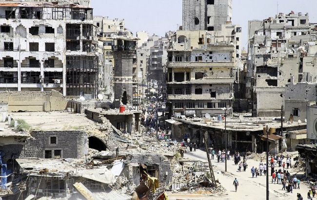 Война в Сирии: повстанцы покидают Хомс после соглашения о перемирии