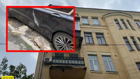 В Киеве фасад дома обрушился на автомобиль: может повториться в любой момент