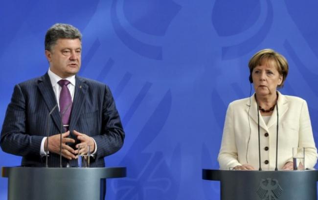 Порошенко и Меркель подчеркнули важность трехсторонней контактной группы в урегулировании конфликта на Донбассе