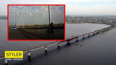 "Копы" Андрей и Юлия спасли женщину, которая хотела прыгнуть с моста: видео героического поступка