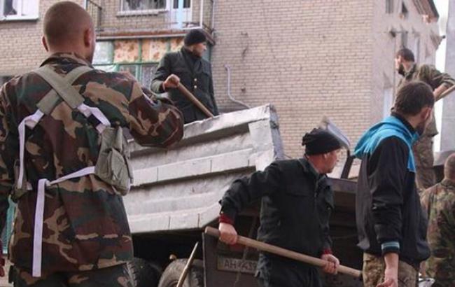 Бойовики використовують полонених українських солдатів для відновлення Іловайська, - Міноборони