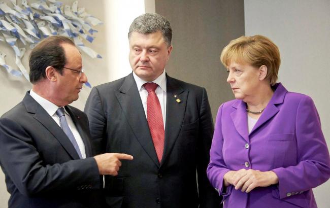 Порошенко проводить зустріч з Меркель і Олланд