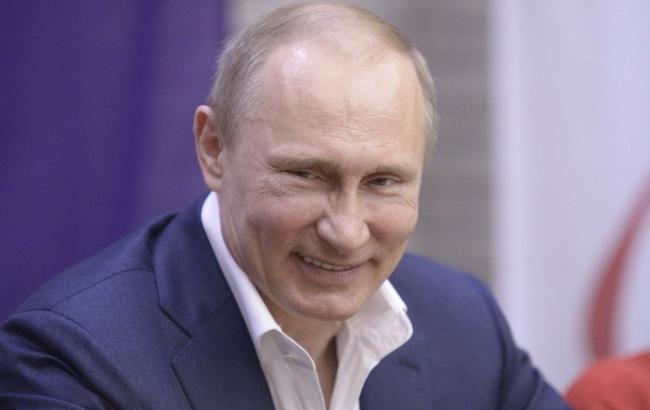 Росіянин увічнив на своїх зубах Путіна і Трампа