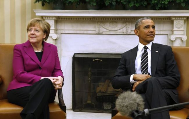 Обама и Меркель выступили за сохранение санкций против РФ