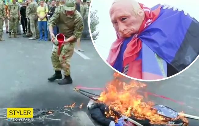 Акция под посольством России: активисты сожгли чучело Путина