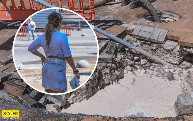 В центре Днепра девушка провалилась по шею в яму с водой: еле вытащили (видео)