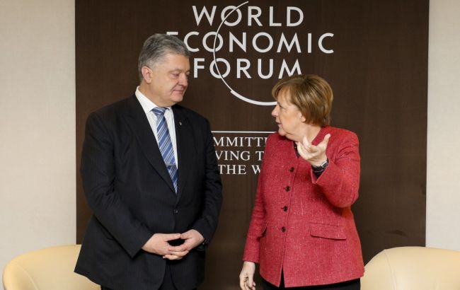 Порошенко та Меркель домовилися щодо запобігання втручанню РФ у вибори