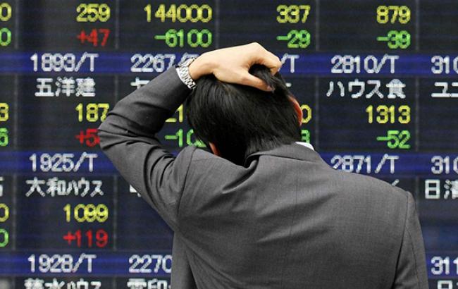 Азіатські фондові ринки знизилися в середу під впливом місцевих новин