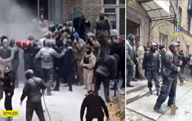 В Киеве рейдеры с дымовыми шашками выселяют жильцов общежития (видео)