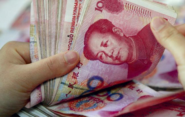 Китай укрепил юань на 0,05%