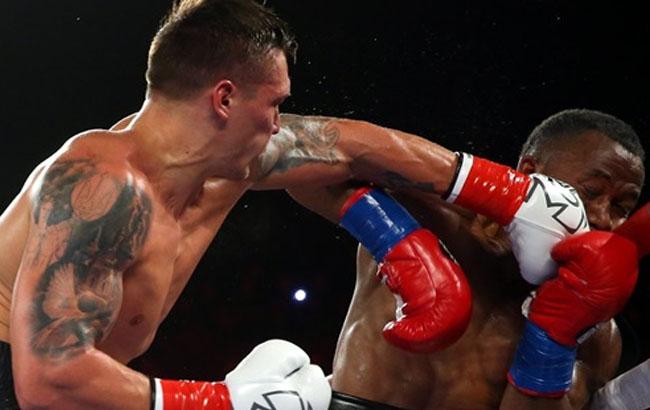 Усик с ссадинами на лице поблагодарил болельщиков за поддержку