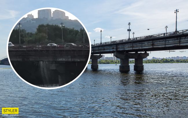 В Киеве "устал" еще один мост: там образовался водопад (видео)