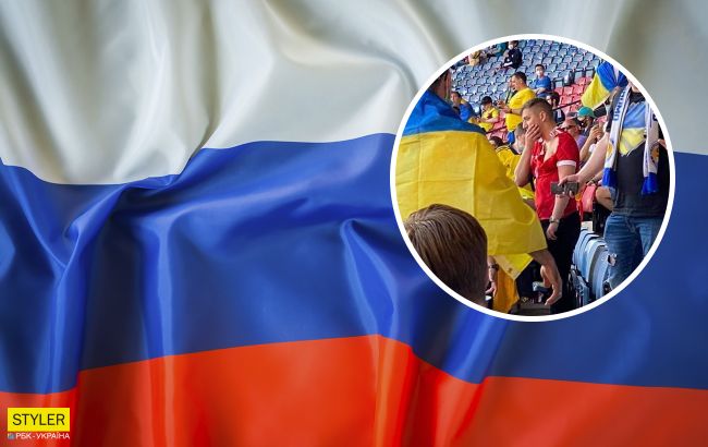 На матче Украина - Швеция знатно проучили фаната с российским флагом (видео)