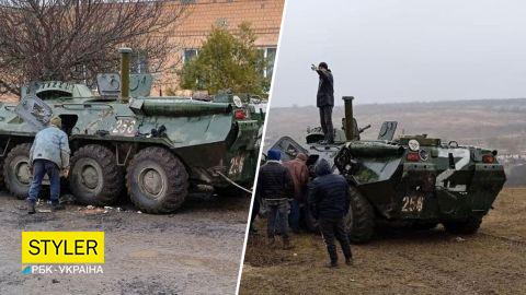 Под Николаевом местные жители захватили вражеский БТР и укатили его на тракторе (фото)
