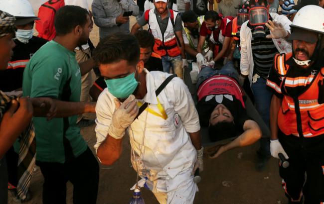 На границе сектора Газа в ходе столкновений пострадали почти 400 человек
