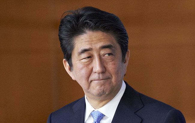 Коалиция премьера Японии получила большинство в парламенте