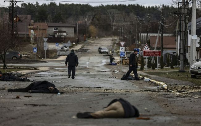В Буче тела на улицах лежали неделями. Спутниковые снимки опровергают заявления РФ
