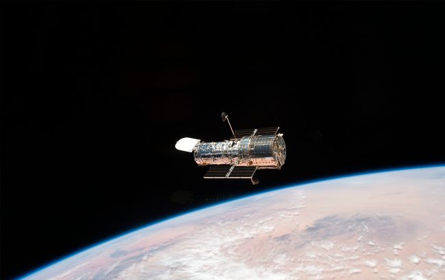Hubble сфотографировал "слияние" двух галактик: яркий кадр