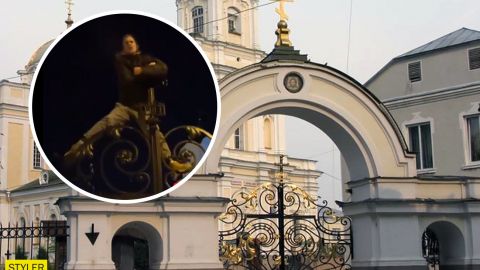 В Луцке парень "под кайфом" залез на ворота собора и его постигла мгновенная расплата (видео)