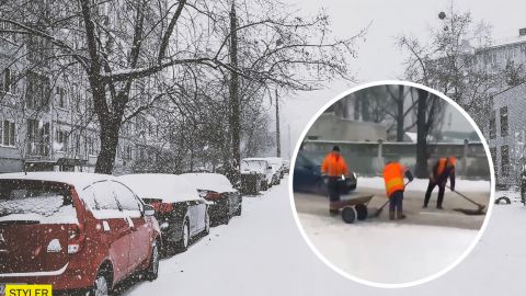 У Києві комунальники клали асфальт у снігопад: завзятий ремонт потрапив на відео