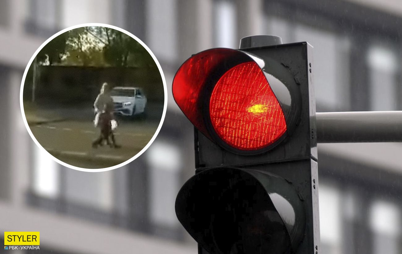 Мать с ребенком в е решила перейти дорогу на красный свет - видео .