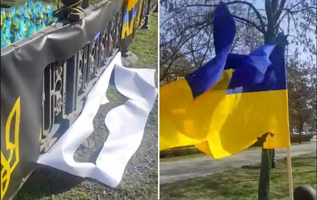 Вандалы поиздевались над государственными флагами на мемориале павшим бойцам (видео)