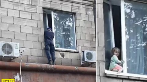 В Запорожье военный спас 2-летнюю девочку от падения из окна: душещипательные кадры