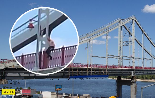 В Киеве мужчина средь бела дня бросился с Пешеходного моста в реку (видео)
