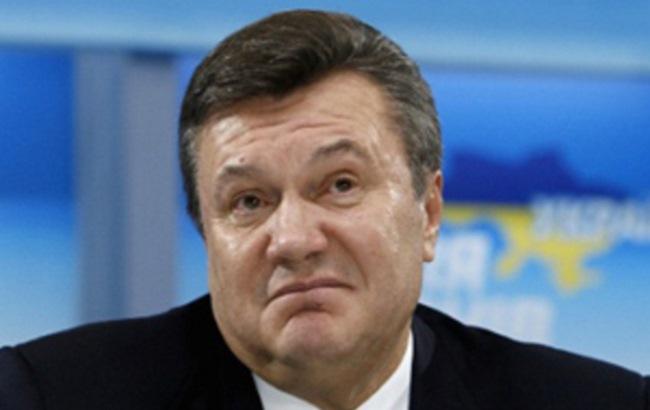 За батоном забегал: в киевском супермаркете засекли двойника Януковича