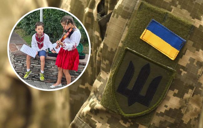 В Киеве маленький мальчик помогал сестренке, которая игрой на скрипке собирала деньги для ВСУ (фото)