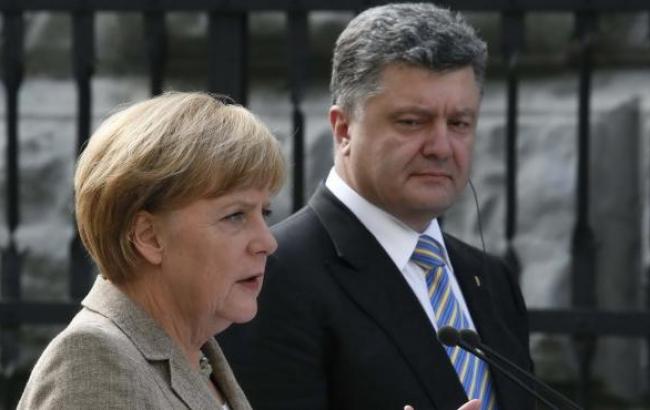 Порошенко и Меркель настаивают на необходимости освобождения всех заложников