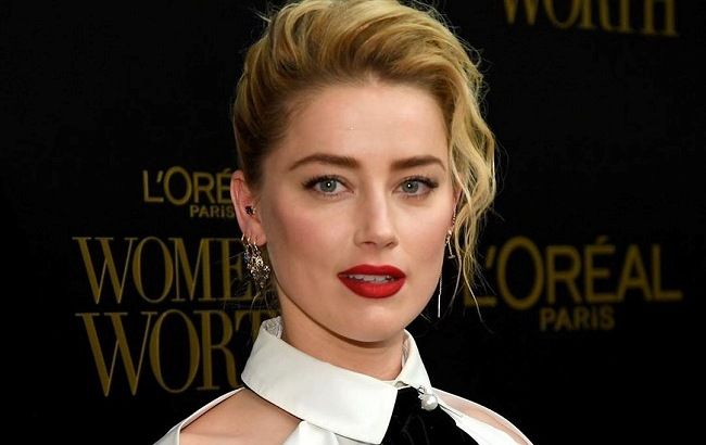 Екс-дружина Джонні Деппа була помічена за жарким поцілунком з онкохворою жінкою