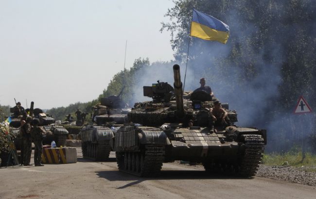 В Донецкой обл. продолжается бой между силами АТО и боевиками, - штаб